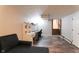 Spacious finished basement with a sitting area and a workspace at 2355 W State Road 234, Fortville, IN 46040