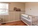 Charming Bedroom featuring a crib and custom wall art at 2355 W State Road 234, Fortville, IN 46040