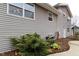 Gray sided house with landscaping and central air conditioning unit at 2355 W State Road 234, Fortville, IN 46040