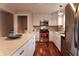 Updated kitchen with stainless steel appliances and hardwood floors at 2355 W State Road 234, Fortville, IN 46040