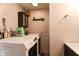 Clean laundry room, featuring a washer, dryer and cabinetry at 2355 W State Road 234, Fortville, IN 46040