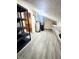 Unfinished storage area with shelving and water heater at 4835 Franklin Villas Dr, Indianapolis, IN 46237
