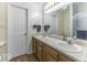 Clean bathroom with double sinks and a shower at 8520 Bison Woods Ct, Indianapolis, IN 46227