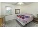 Spacious bedroom with a queen bed and ample space at 8520 Bison Woods Ct, Indianapolis, IN 46227
