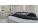 Bright bedroom featuring a dresser and a comfy bed at 8520 Bison Woods Ct, Indianapolis, IN 46227