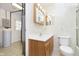 Small bathroom with a vanity, toilet, and shower at 8530 Meadowlark Dr, Indianapolis, IN 46226