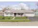 Ranch home with attached garage and fenced yard at 8530 Meadowlark Dr, Indianapolis, IN 46226