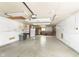 Spacious garage with ample storage shelving and overhead lighting at 8530 Meadowlark Dr, Indianapolis, IN 46226