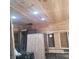 Unfinished interior with exposed wooden ceiling and recessed lighting, and construction materials at 2845 Forest Manor Ave, Indianapolis, IN 46218