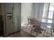 Eat-in kitchen with stainless steel appliances and wood flooring at 306 E Cherry St, Advance, IN 46102