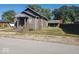 Charming bungalow with stone accents, front porch, and a spacious yard at 306 E Cherry St, Advance, IN 46102