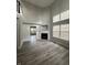 Spacious living room with gray walls, fireplace, and hardwood floors at 3518 Birchfield Pl, Indianapolis, IN 46268