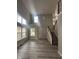 Two-story living room with hardwood floors and a lot of natural light at 3518 Birchfield Pl, Indianapolis, IN 46268