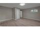 Bedroom with gray walls, vinyl flooring and a closet at 3745 N Kercheval Dr, Indianapolis, IN 46226
