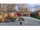 Front view of charming brick house with a well-maintained yard at 3745 N Kercheval Dr, Indianapolis, IN 46226