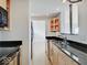 Modern kitchen with granite countertops and stainless steel appliances at 3965 N Meridian St # 7E, Indianapolis, IN 46208