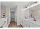 Bathroom with double vanity, quartz countertop, and a shower at 4973 Amber Crest Dr, Brownsburg, IN 46112