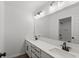Bathroom with double vanity, quartz countertop, and a shower at 4973 Amber Crest Dr, Brownsburg, IN 46112