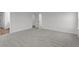 Spacious bedroom with gray carpet and access to other rooms at 4973 Amber Crest Dr, Brownsburg, IN 46112