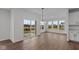 Spacious dining area with hardwood floors and sliding glass doors at 4973 Amber Crest Dr, Brownsburg, IN 46112