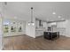 Bright dining area with hardwood floors and sliding glass doors to backyard at 4973 Amber Crest Dr, Brownsburg, IN 46112