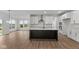 Modern kitchen with white cabinets, granite countertops, and a large island at 4973 Amber Crest Dr, Brownsburg, IN 46112