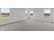 Main bedroom with gray carpet and multiple windows at 4973 Amber Crest Dr, Brownsburg, IN 46112