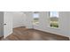 Bright office space with hardwood floors and two windows at 4973 Amber Crest Dr, Brownsburg, IN 46112