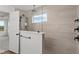 Walk-in shower with glass enclosure and neutral tile at 4973 Amber Crest Dr, Brownsburg, IN 46112