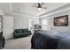 Main bedroom with a comfy couch, large bed, and lots of natural light at 10797 Walden Ln, Brownsburg, IN 46112