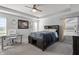 Bright bedroom with a desk, large bed, and plenty of natural light at 10797 Walden Ln, Brownsburg, IN 46112