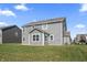 Gray two story house with a patio and yard at 10797 Walden Ln, Brownsburg, IN 46112