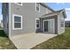 Gray two story house with a sliding glass door to patio at 10797 Walden Ln, Brownsburg, IN 46112