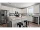 Modern kitchen with stainless steel appliances and an island at 10797 Walden Ln, Brownsburg, IN 46112