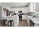 Modern kitchen with stainless steel appliances and an island at 10797 Walden Ln, Brownsburg, IN 46112