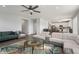Spacious living room featuring a sectional sofa and open floor plan at 10797 Walden Ln, Brownsburg, IN 46112