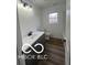Updated bathroom with gray vanity and bathtub at 11 S 1050 W, Jamestown, IN 46147