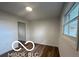 Simple bedroom with wood-look floors and closet at 11 S 1050 W, Jamestown, IN 46147