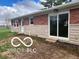 Brick ranch house with attached garage and landscaped yard at 11 S 1050 W, Jamestown, IN 46147