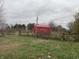 Red metal outbuilding in a field at 11 S 1050 W, Jamestown, IN 46147