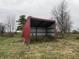 Open-faced red metal storage shed at 11 S 1050 W, Jamestown, IN 46147