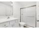 Clean bathroom with a shower/tub combo and white vanity at 1492 Coen Ct, Columbus, IN 47201