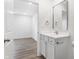 Simple bathroom with a vanity, mirror, and toilet at 1492 Coen Ct, Columbus, IN 47201