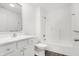 Clean bathroom with a shower/tub combo and white vanity at 1492 Coen Ct, Columbus, IN 47201