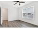 Spacious bedroom featuring wood-look floors and a large window at 1492 Coen Ct, Columbus, IN 47201