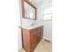 Bathroom with vanity, mirror, and tiled floor at 408 N Sherwood Dr, Muncie, IN 47304
