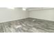 Finished basement with grey plank flooring at 408 N Sherwood Dr, Muncie, IN 47304