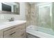 Modern bathroom with walk-in shower and floating vanity at 408 N Sherwood Dr, Muncie, IN 47304