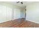 Well-lit bedroom with hardwood floors and double closets at 408 N Sherwood Dr, Muncie, IN 47304