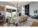Spacious dining area with table and chairs, offering views of backyard at 6427 Nicoson Way, Indianapolis, IN 46259